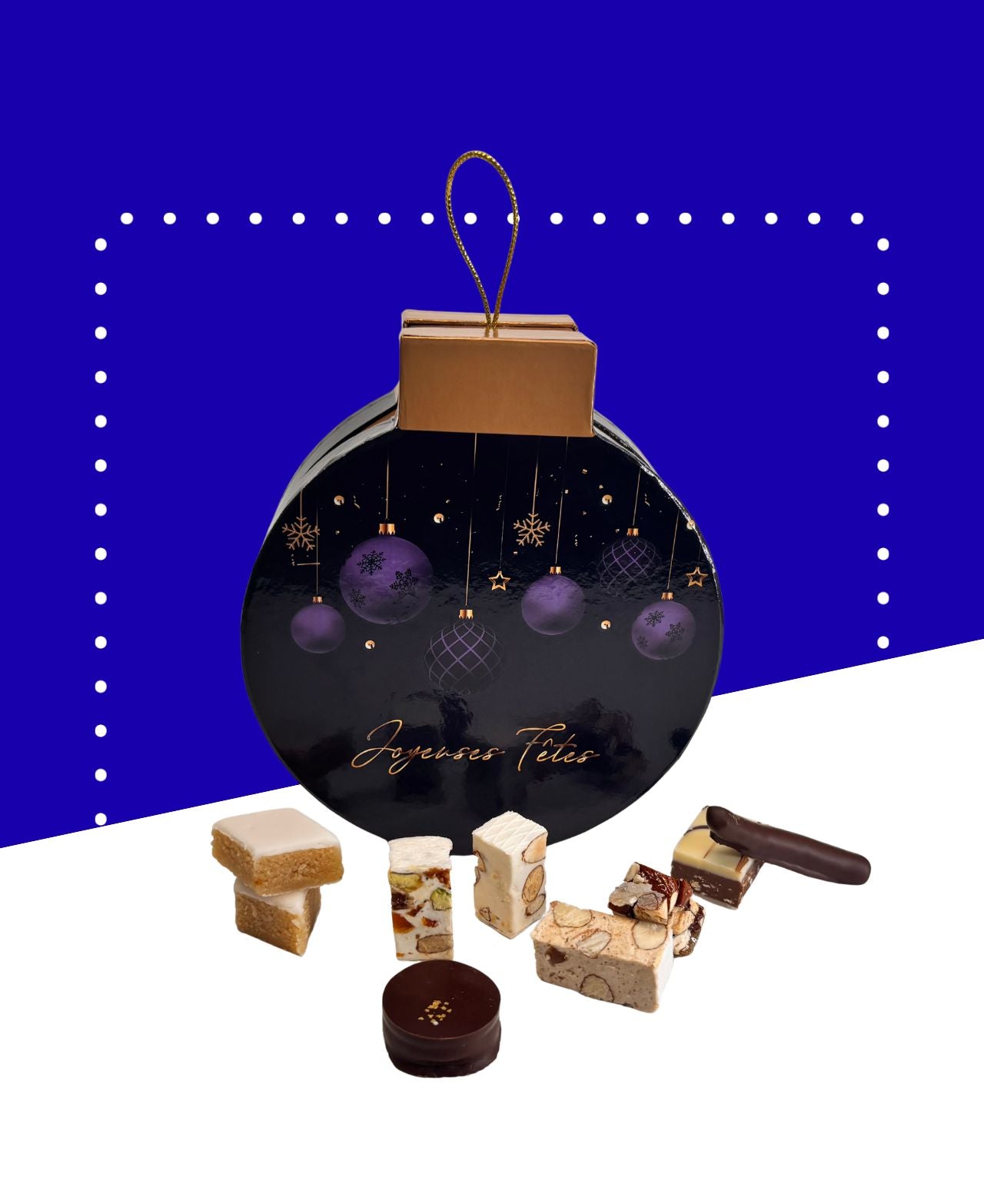Boîte ronde de Noël contenant nougats, calissons et chocolats emballés variés.