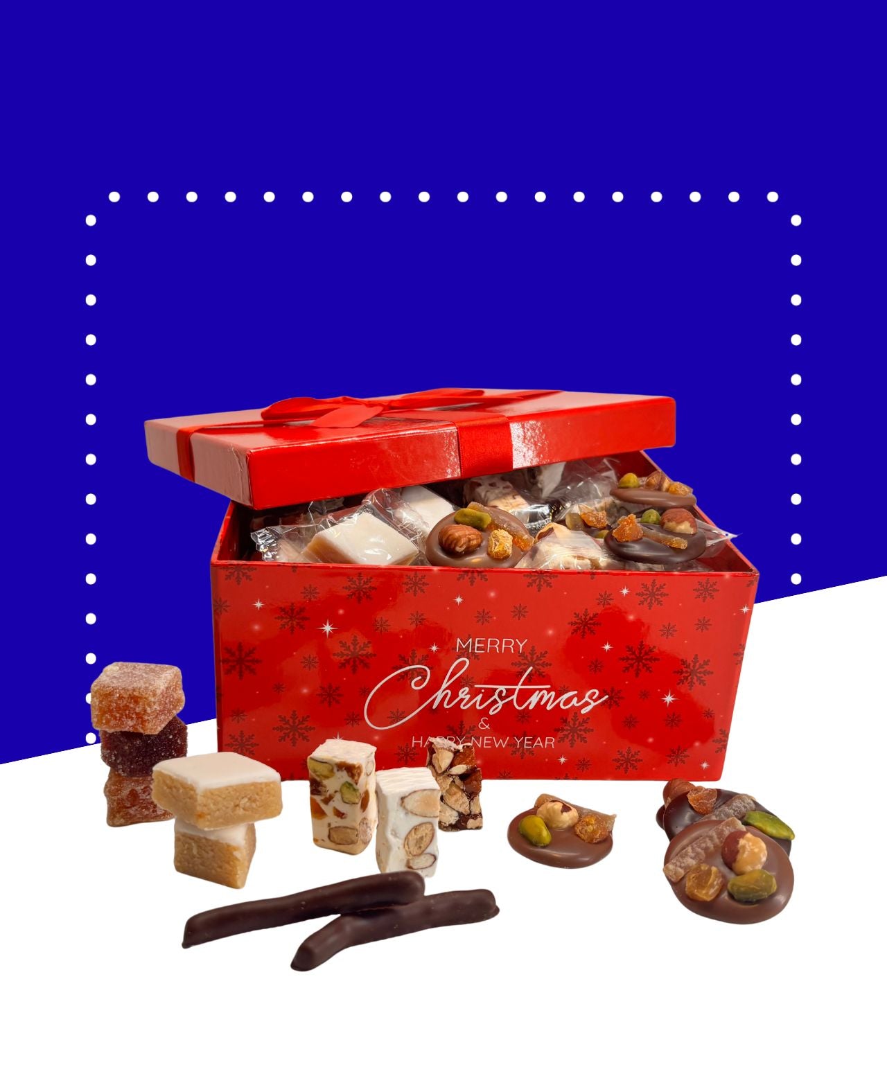 Coffret contenant nougats, calissons, chocolats et pâtes de fruits, pesant 690g au total.
