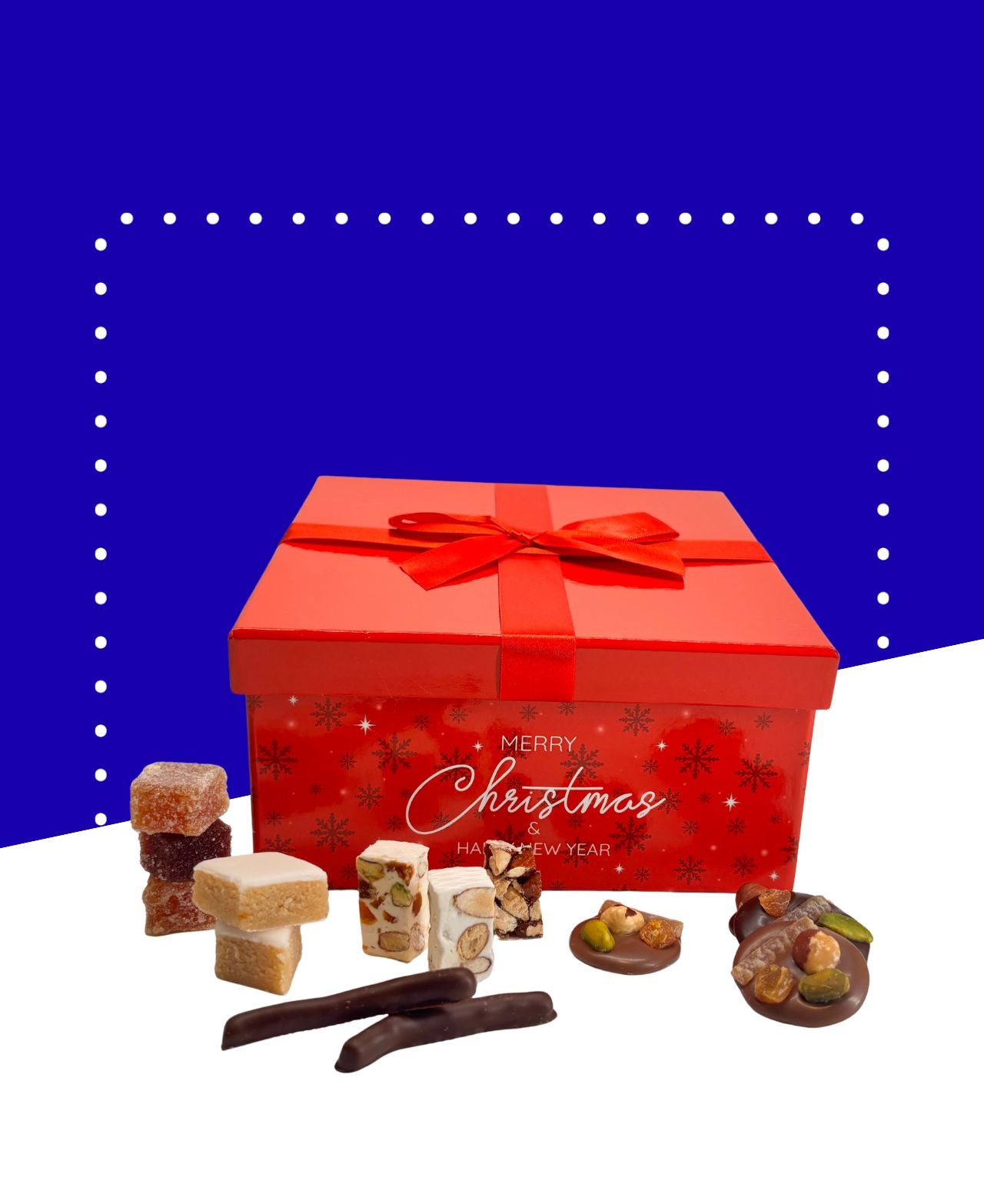 Coffret contenant nougats, calissons, chocolats et pâtes de fruits dans un emballage festif.