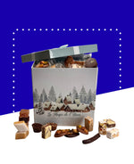 Grand coffret gourmand avec nougats, calisson, chocolats et pâtes de fruits variés.