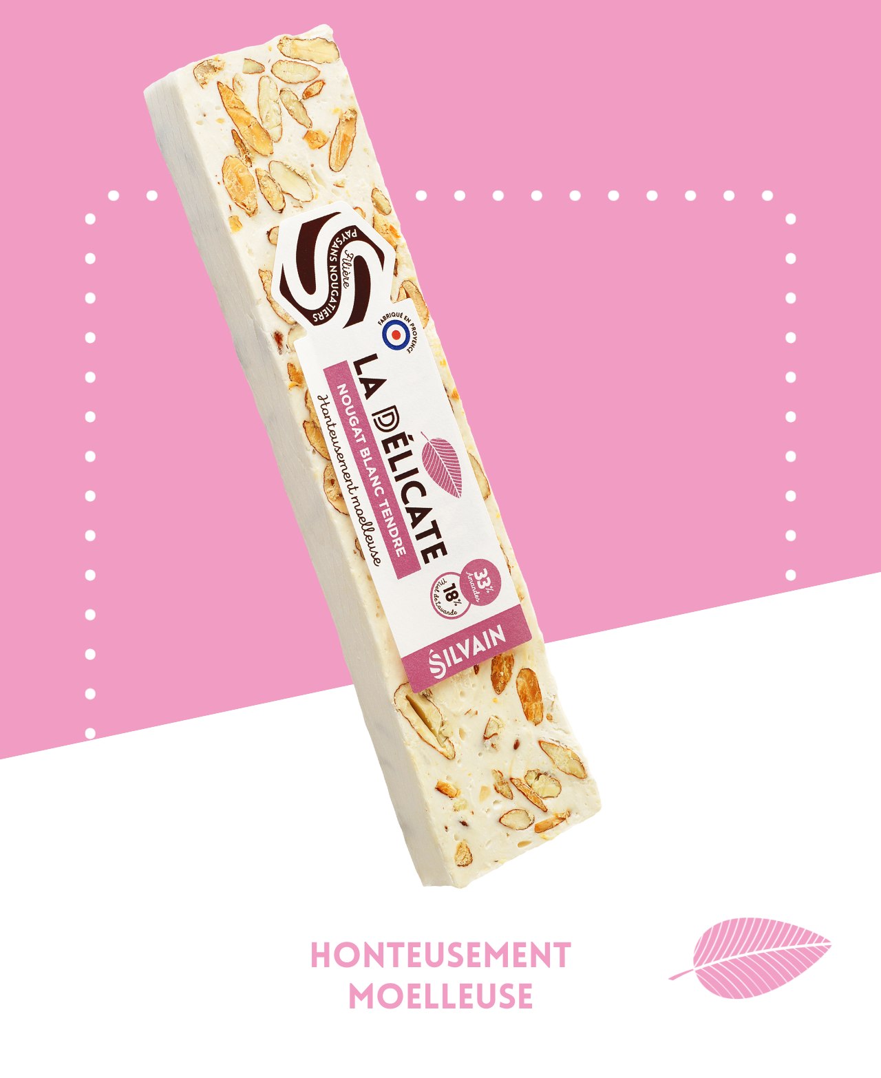 Tendre nougat blanc avec amandes grillées et miel de lavande, présenté en morceaux.