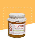 Un pot de confiture de pastèque provençale, étiqueté "Confiture Merveille".
