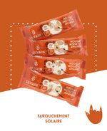 Nougat blanc aux noisettes et amandes, présenté en un paquet de 30 g.