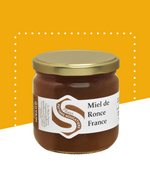 Pot de miel de ronce récolté en prairies de la Bresse avec étiquette apiculteur Paysans Nougatiers