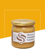 Pot de miel de tournesol de 500g, couleur dorée et texture crémeuse.