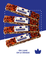 Nougat noir croquant avec 60 % d'amandes, miel caramélisé et arôme d'orange.