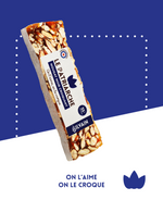 Nougat noir croquant avec amandes, miel caramélisé, arôme d'orange et cognac.