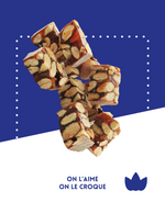 Nougat noir croquant Le Patriarche avec 60% d'amandes, miel caramélisé, arôme d'orange et cognac