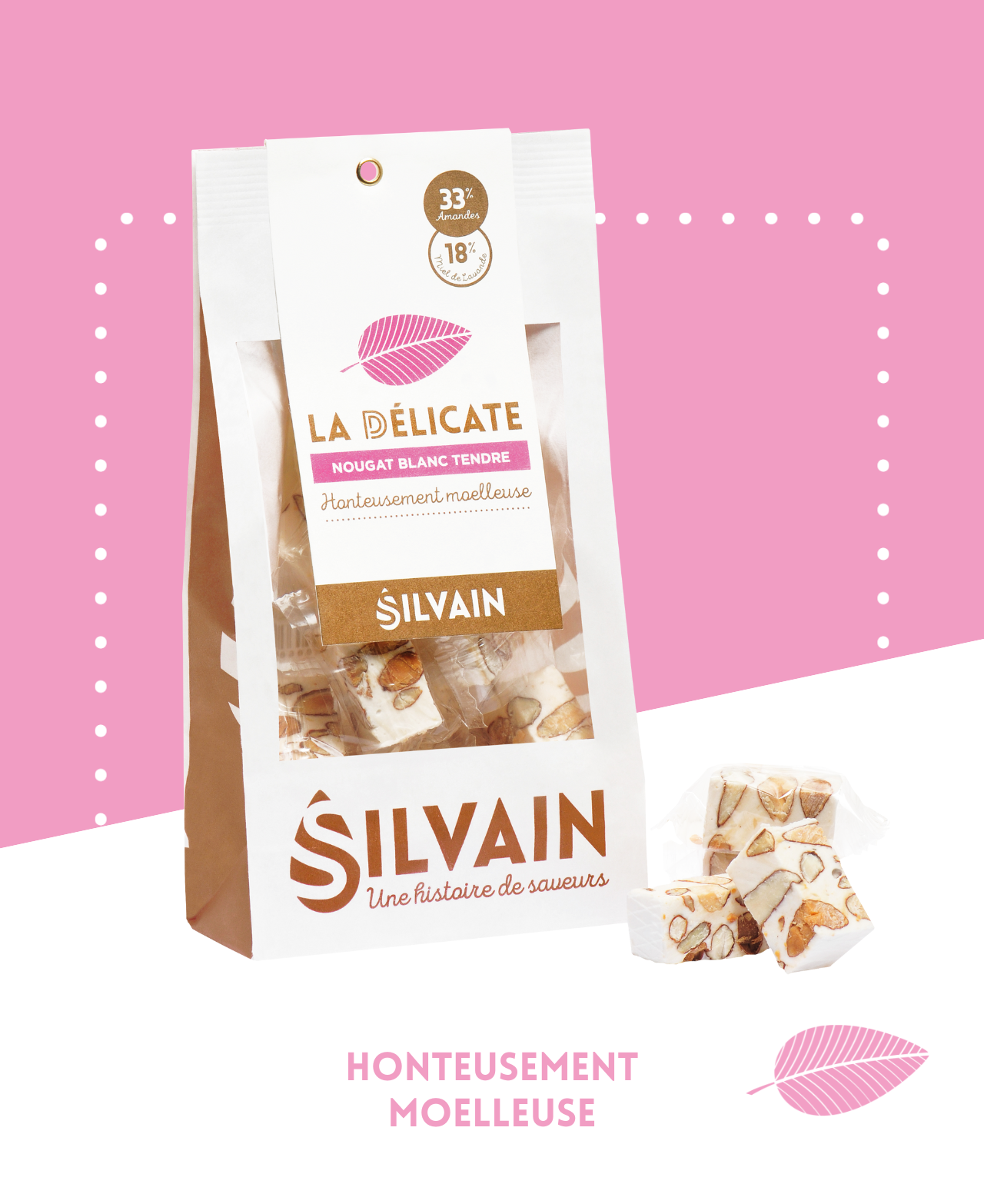 Tendre nougat blanc avec amandes grillées et miel de lavande, présenté en morceaux.